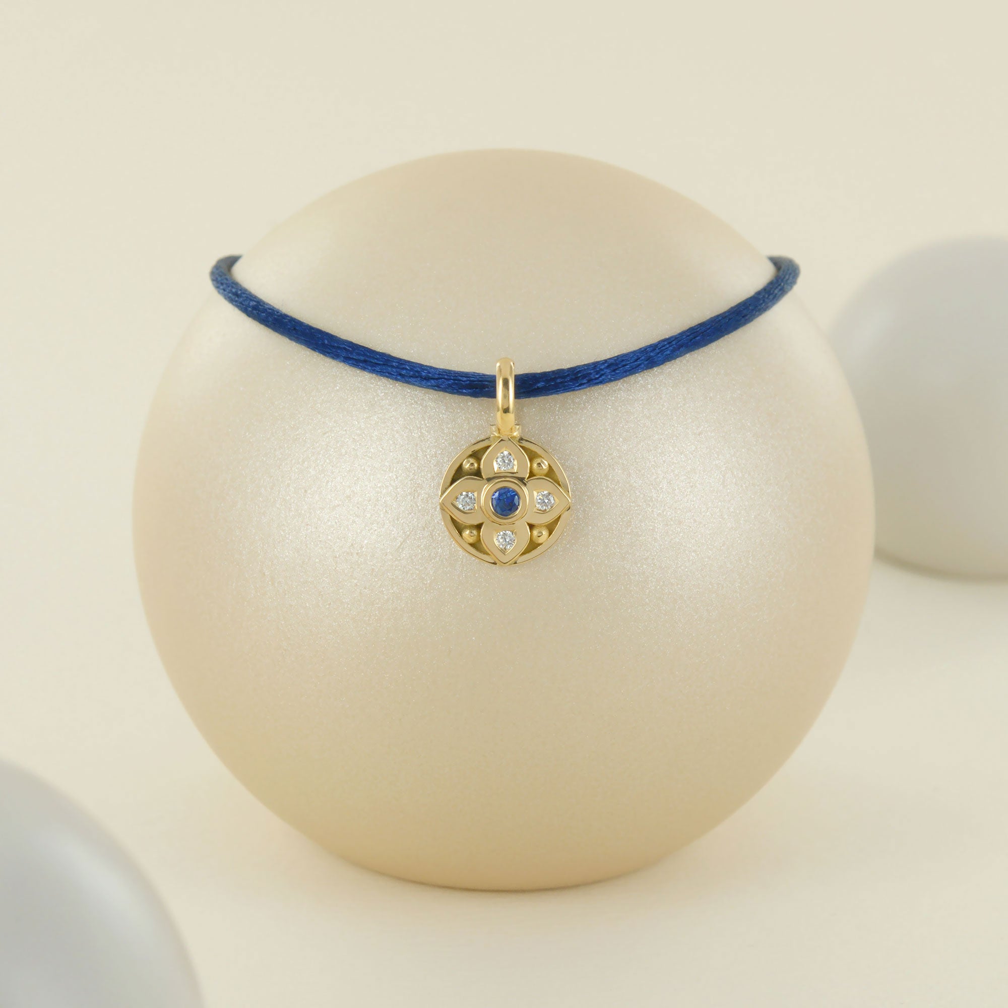 Pendentif vice versa en or jaune, diamants et saphir