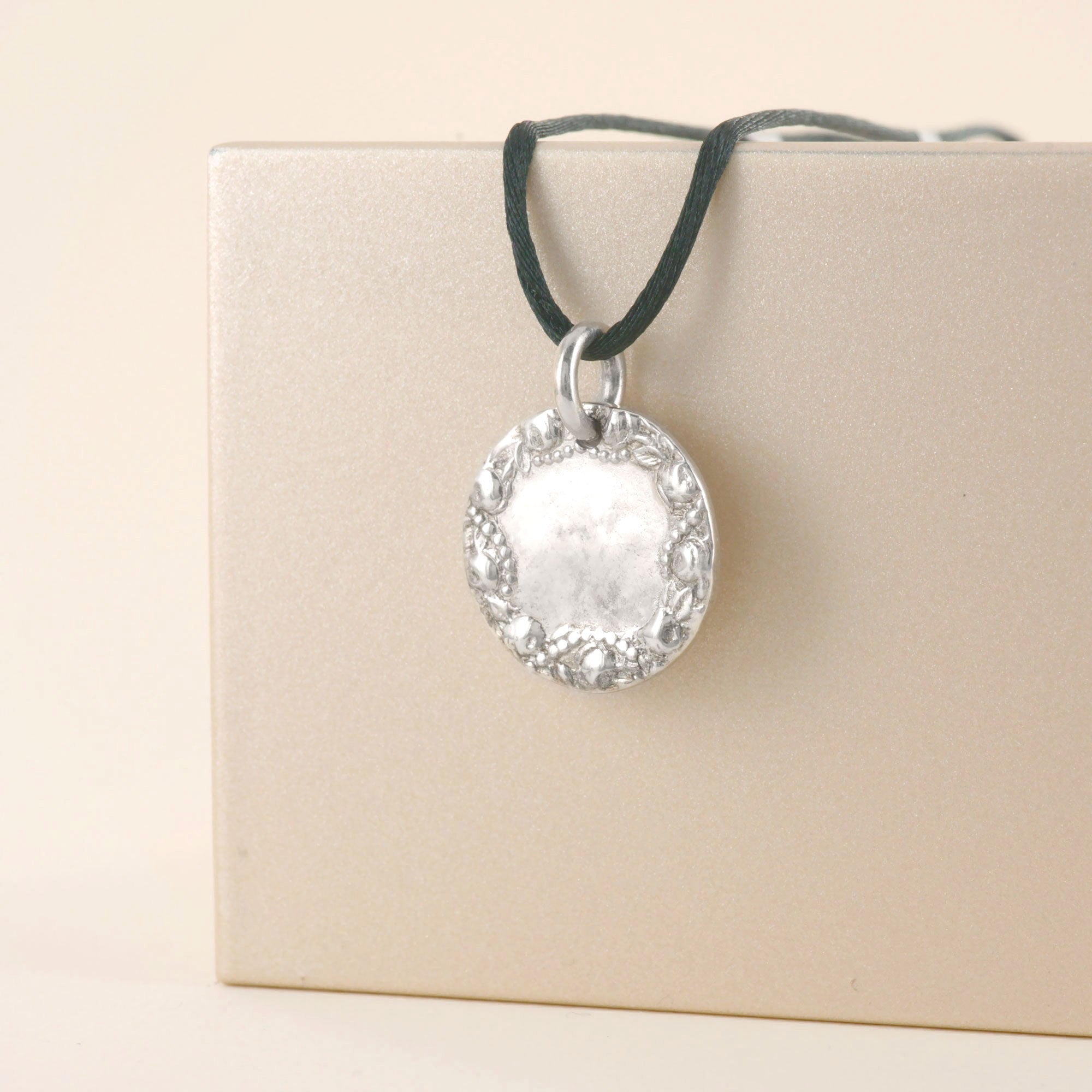 Médaille ronde des filles en argent