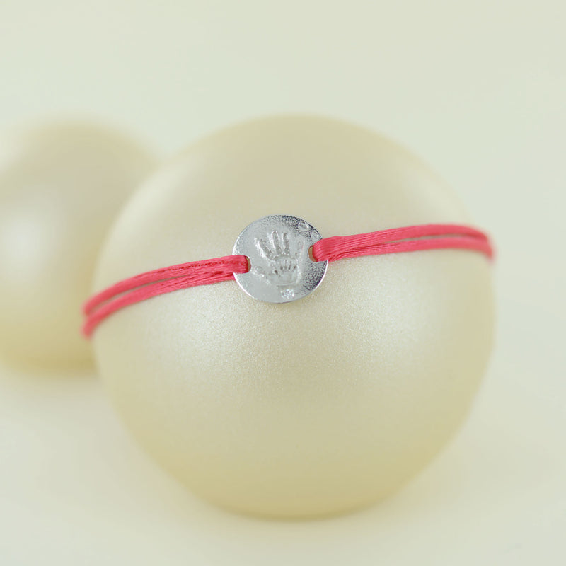 Bracelet lien main dans la main en or blanc et un diamant