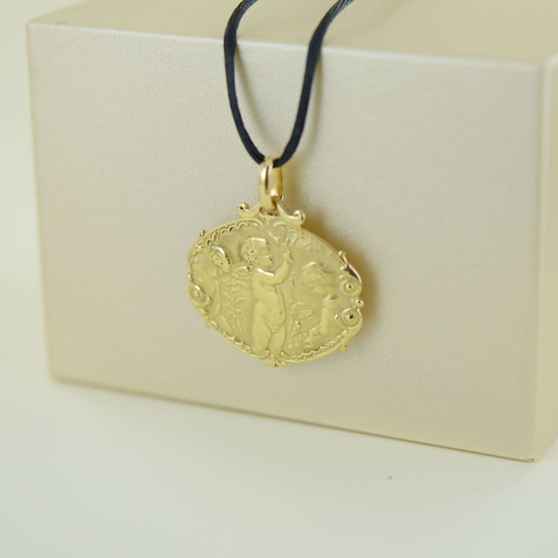 Médaille anges jardiniers en or jaune