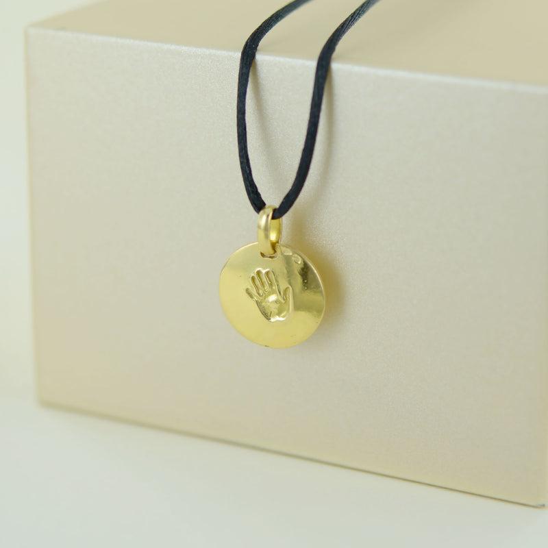 Médaille empreinte gauche en or jaune
