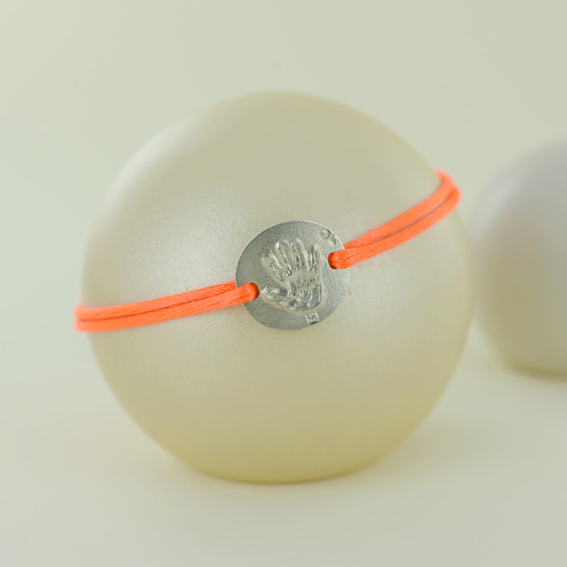 Bracelet lien main dans la main en argent et un diamant
