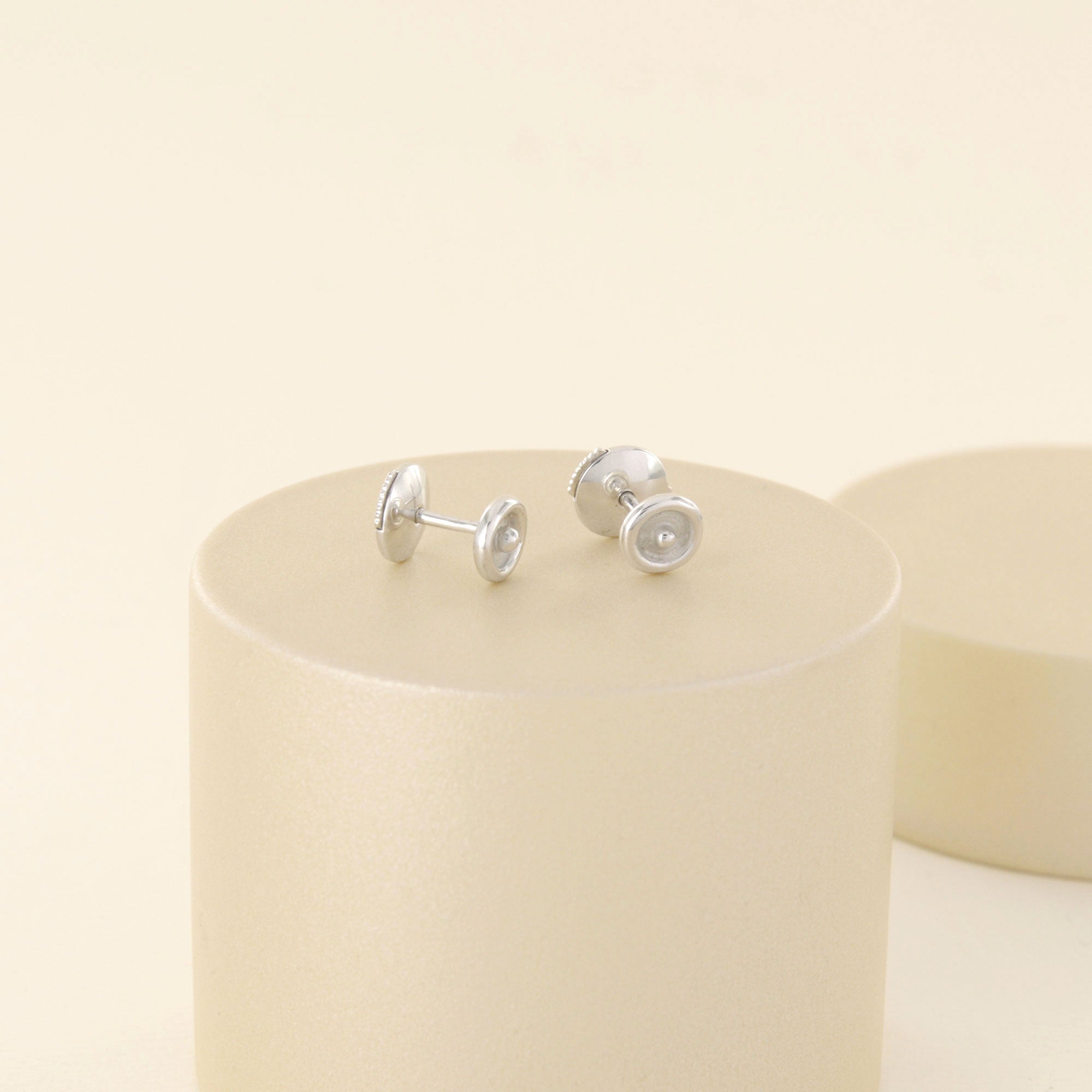 Boucles d'oreilles rondes en or blanc