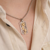 Engrenages Rectangle pendant in white and yellow gold