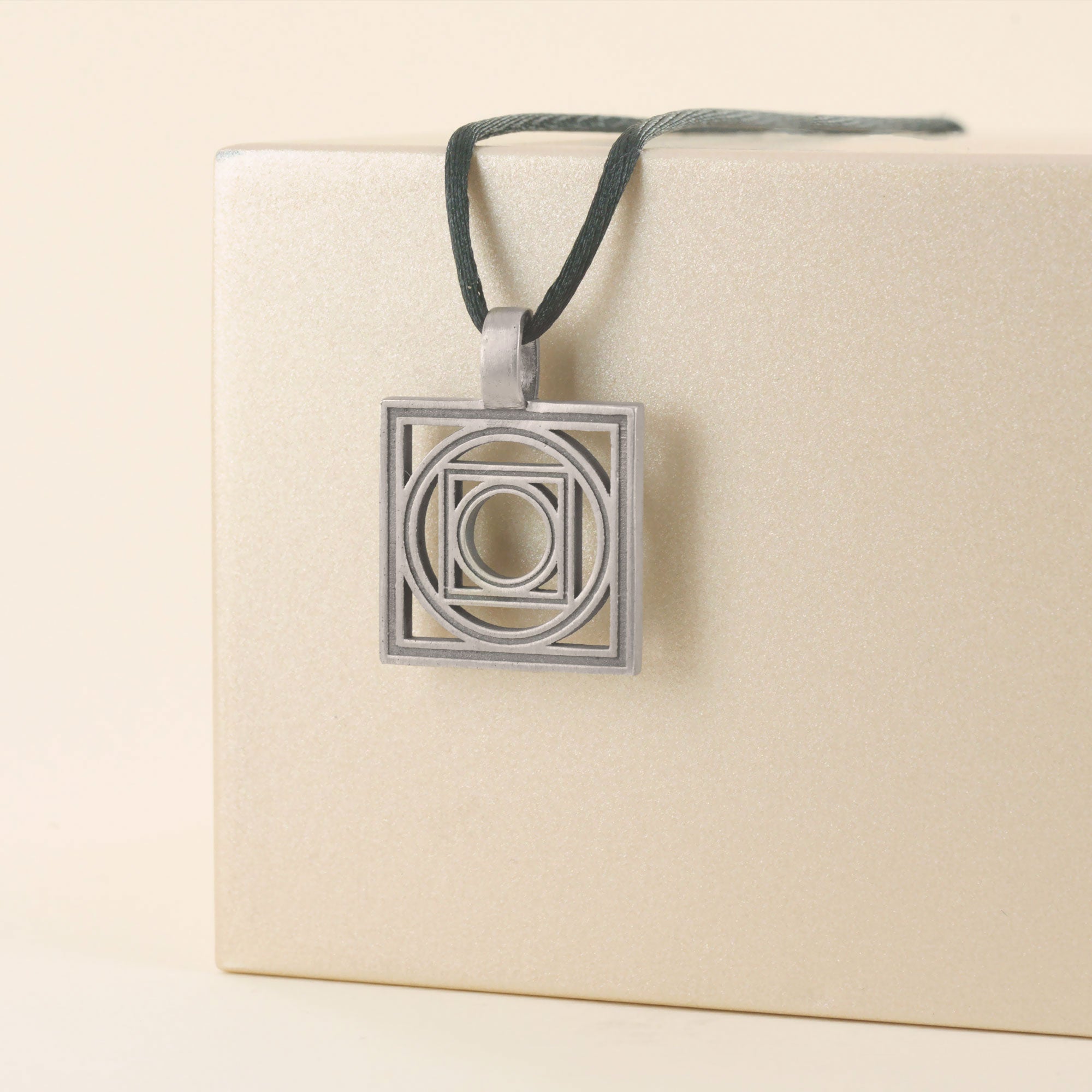 Pendentif trilogie carré et rond en argent