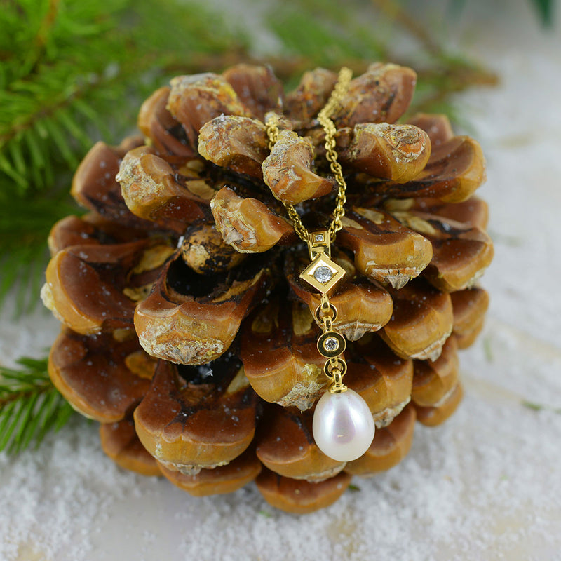 Pendentif unique en or avec perle d'eau douce et diamants