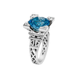 Solitaire French Kiss XL ring in gold with blue topaz