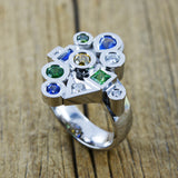 White gold sapphire, tsavorite and diamond ring