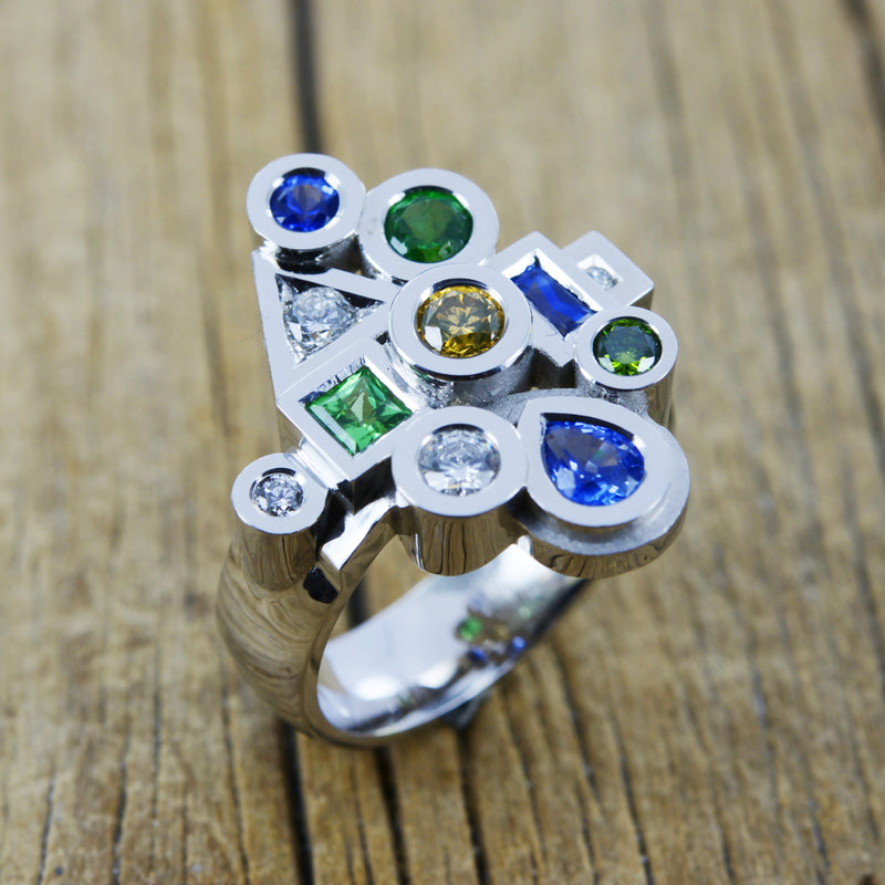 White gold sapphire, tsavorite and diamond ring